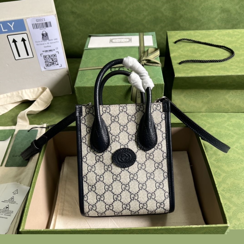 G*u*i top handle bags